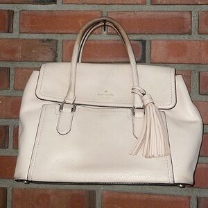 Kate spade bone pink bag fold over large leather McCall tassel wear at handles